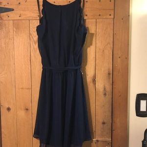 Navy blue dress with scalloped edging